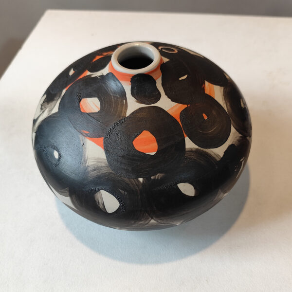 oval jar with an orange touch